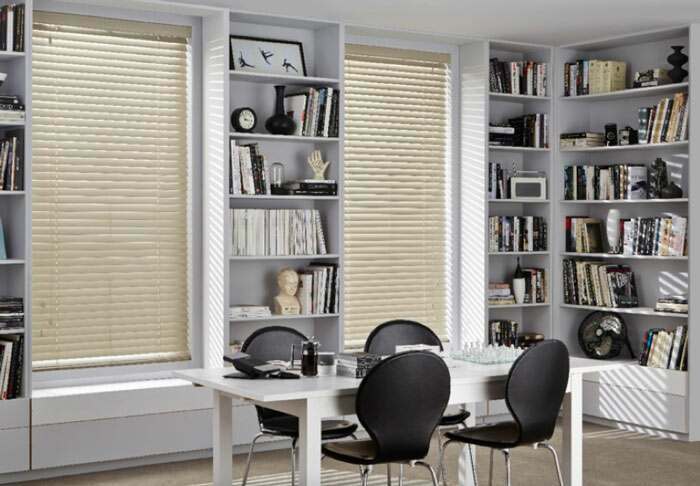 Privacy control with wooden blinds in the office