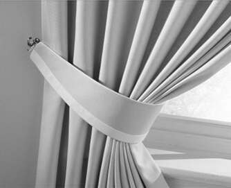 Curtain tie backs with contrasting strip Curtain tie backs with contrasting strip