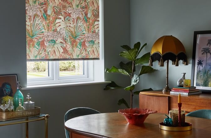 Roller blind with Orange Tropical Patterns Fitted in a living room
