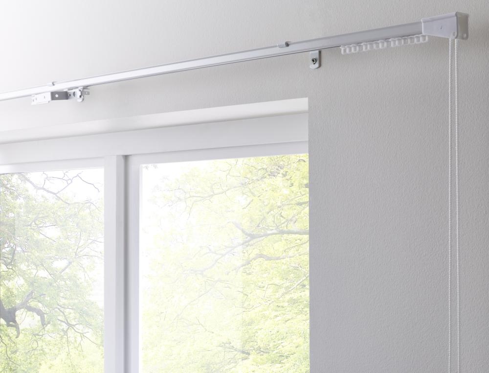 Corded curtain tracks